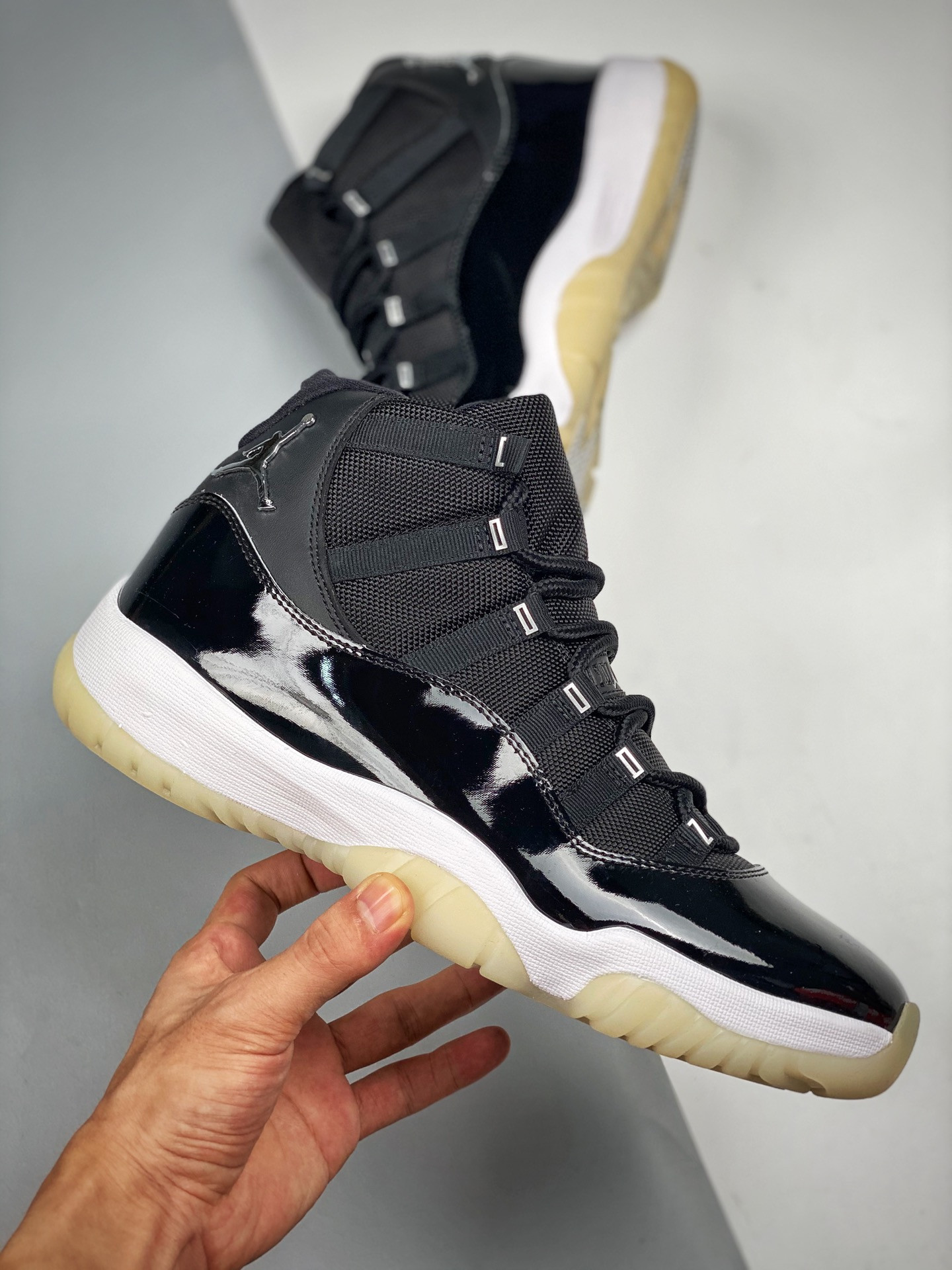 Air Jordan 11 “Jubilee 25th Anniversary” Black/Clear-White-Metallic Silver