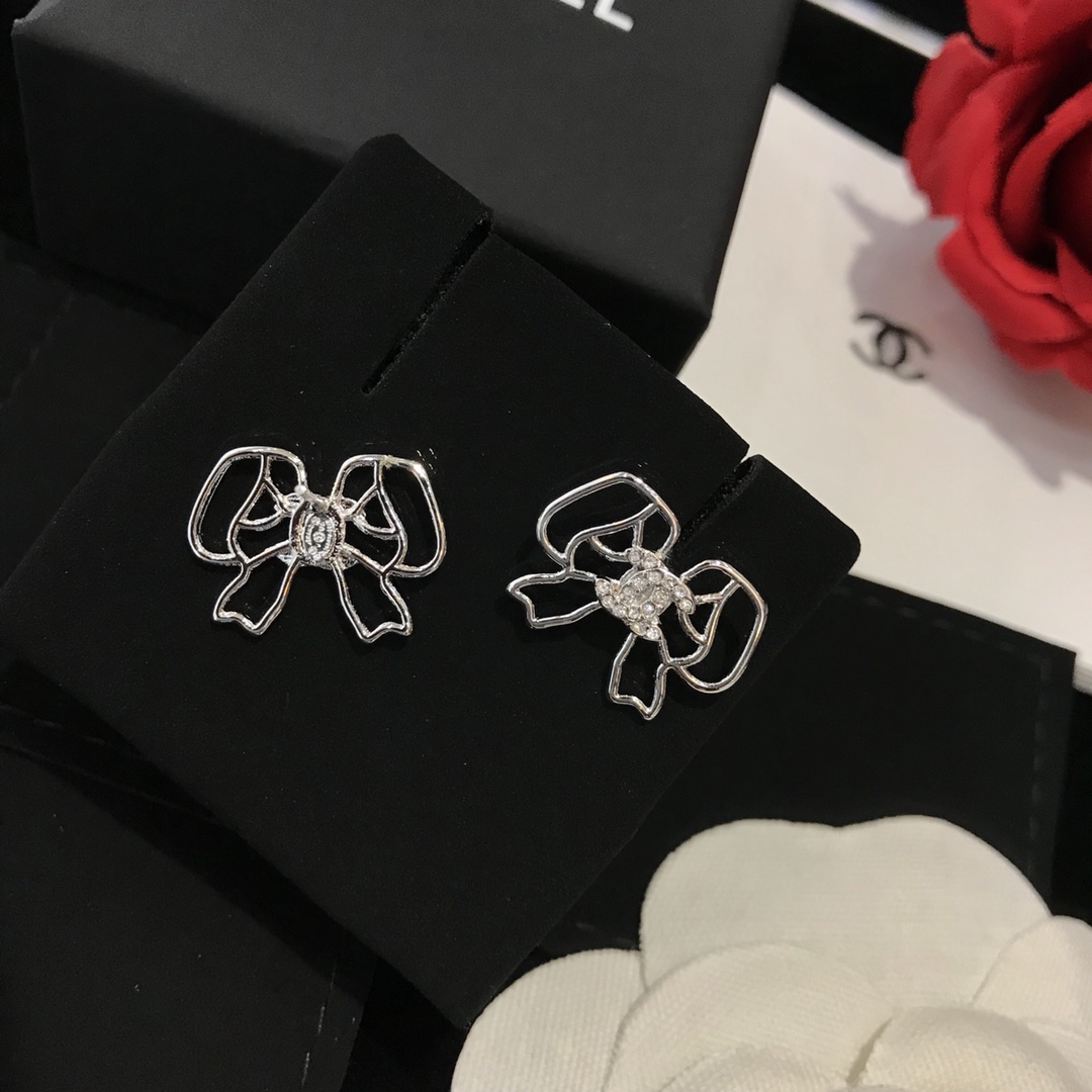 Chanel Lovely Bow Frame Earrings Silver Tone For Women