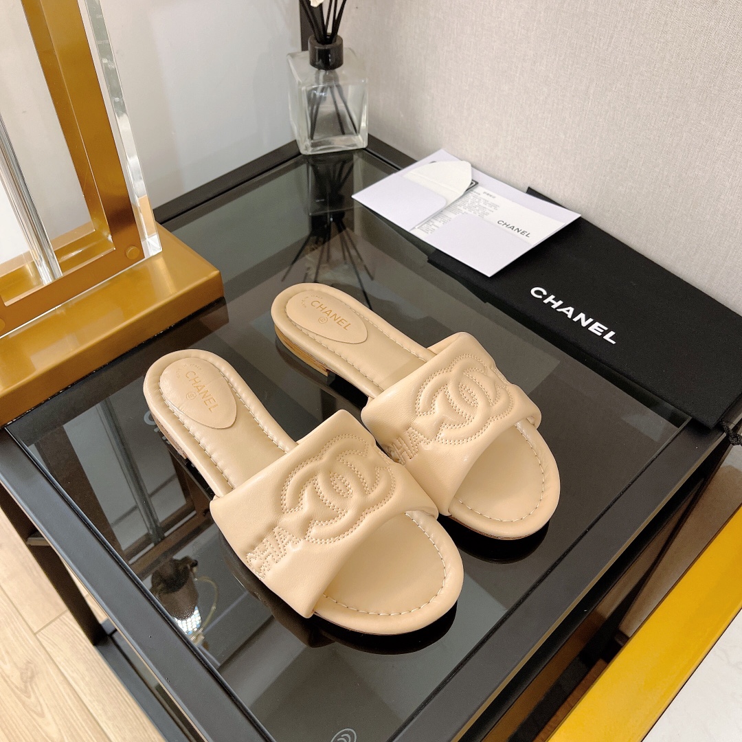 Chanel Women’s Mules With Embossed Chanel Logo Beige For Women