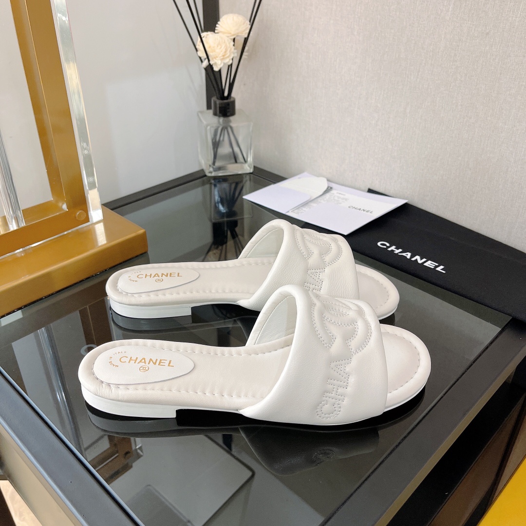 Chanel Women’s Mules With Embossed Chanel Logo White For Women