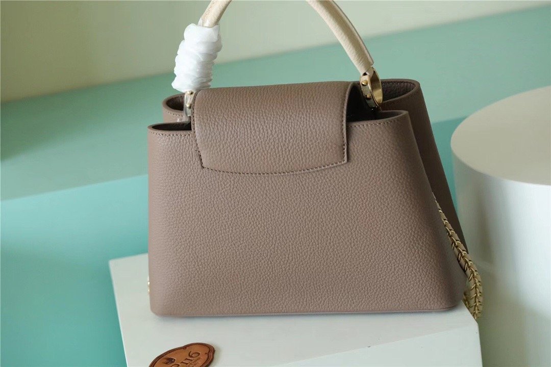 Louis Vuitton Capucines MM Taurillon Smokey Brown Green/ Creme/ Pink For Women, Women’s Bags, Shoulder And Crossbody Bags 12.4in/31.5cm
