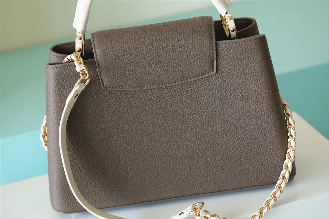 Louis Vuitton Capucines MM Taurillon Smokey Brown Green/ Creme/ Pink For Women, Women’s Handbags, Shoulder And Crossbody Bags 31.5cm/12.4in