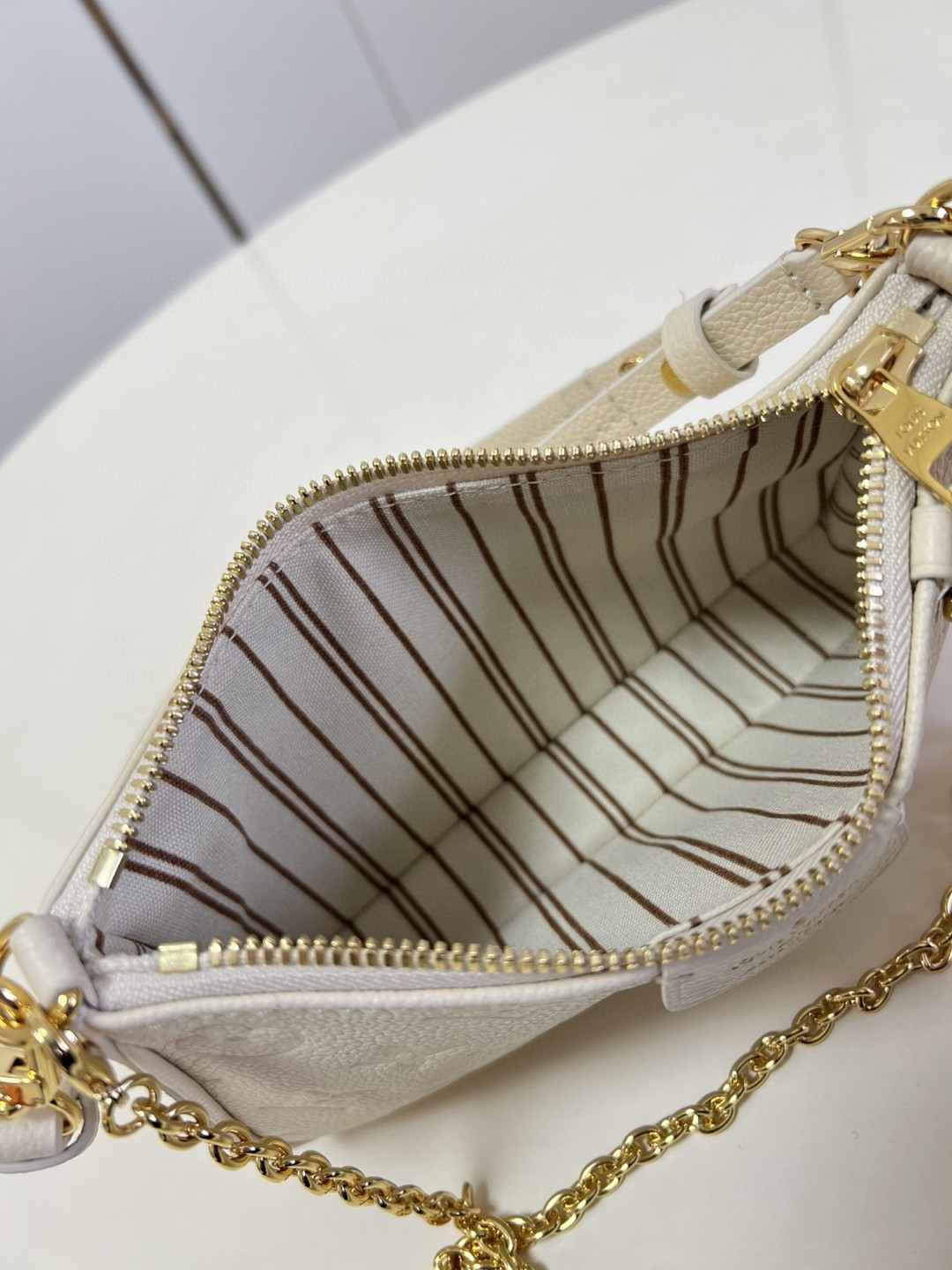 Louis Vuitton Easy Pouch On Strap Monogram Empreinte Crème White For Spring, Women’s Handbags, Shoulder Bags 7.5in/19cm