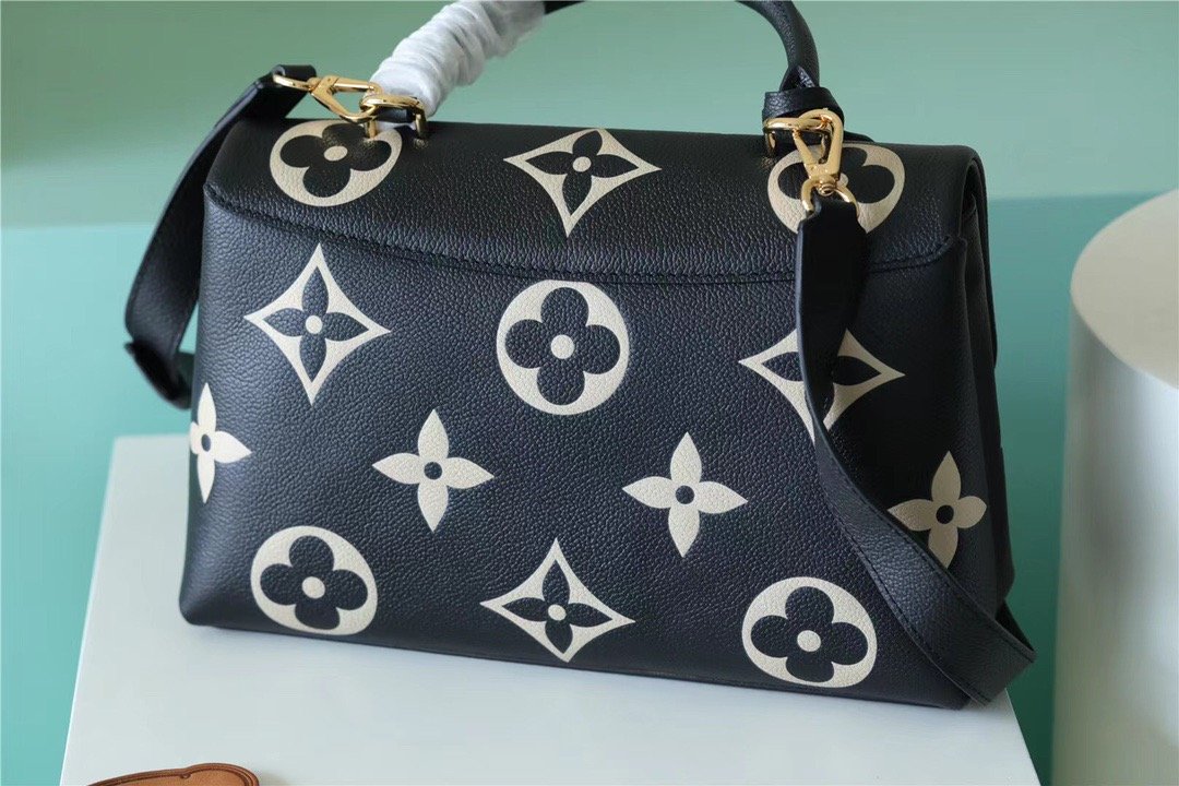 Louis Vuitton Madeleine MM Monogram Empreinte Black / Beige For Women, Women’s Handbags, Shoulder and Crossbody Bags 11.8in/30cm LV 