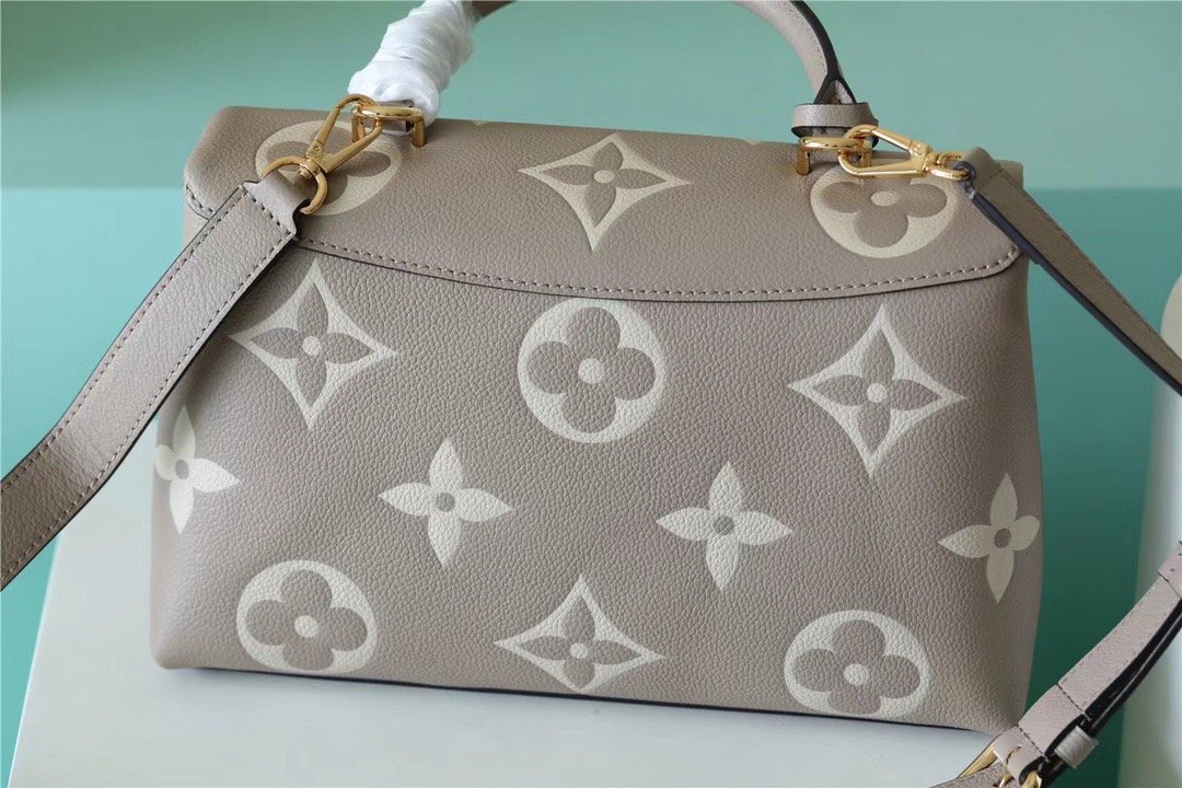 Louis Vuitton Madeleine MM Monogram Empreinte Dove Gray/ Creme Beige For Women, Women’s Handbags, Shoulder and Crossbody Bags 11.8in/30cm