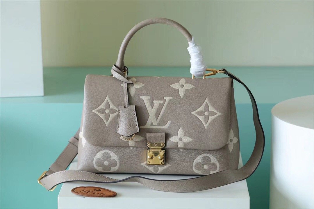 Louis Vuitton Madeleine MM Monogram Empreinte Dove Gray/ Creme Beige For Women, Women’s Handbags, Shoulder and Crossbody Bags 11.8in/30cm