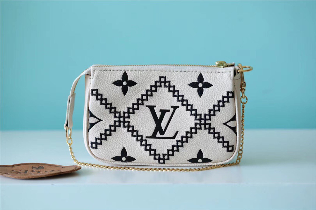 Louis Vuitton Mini Pochette Accessoires Monogram Empreinte White For Women, Women’s Handbags, Shoulder Bags And Crossbody Bags 6.1in/15.5cm LV 