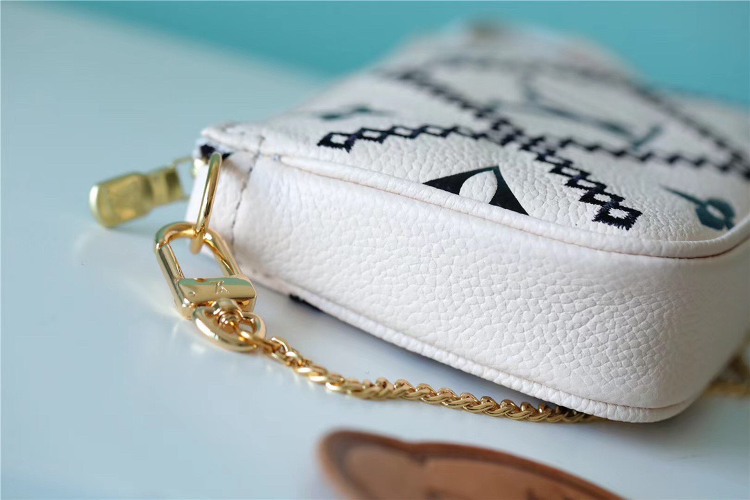 Louis Vuitton Mini Pochette Accessoires Monogram Empreinte White For Women, Women’s Handbags, Shoulder Bags And Crossbody Bags 6.1in/15.5cm LV 