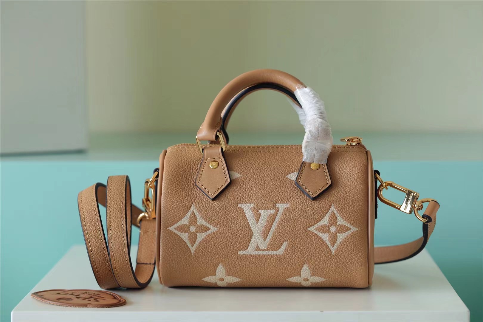Louis Vuitton Nano Speedy Monogram Empreinte Arizona Beige / Cream For Women, Women’s Handbags, Shoulder And Crossbody Bags 6.3in/16cm