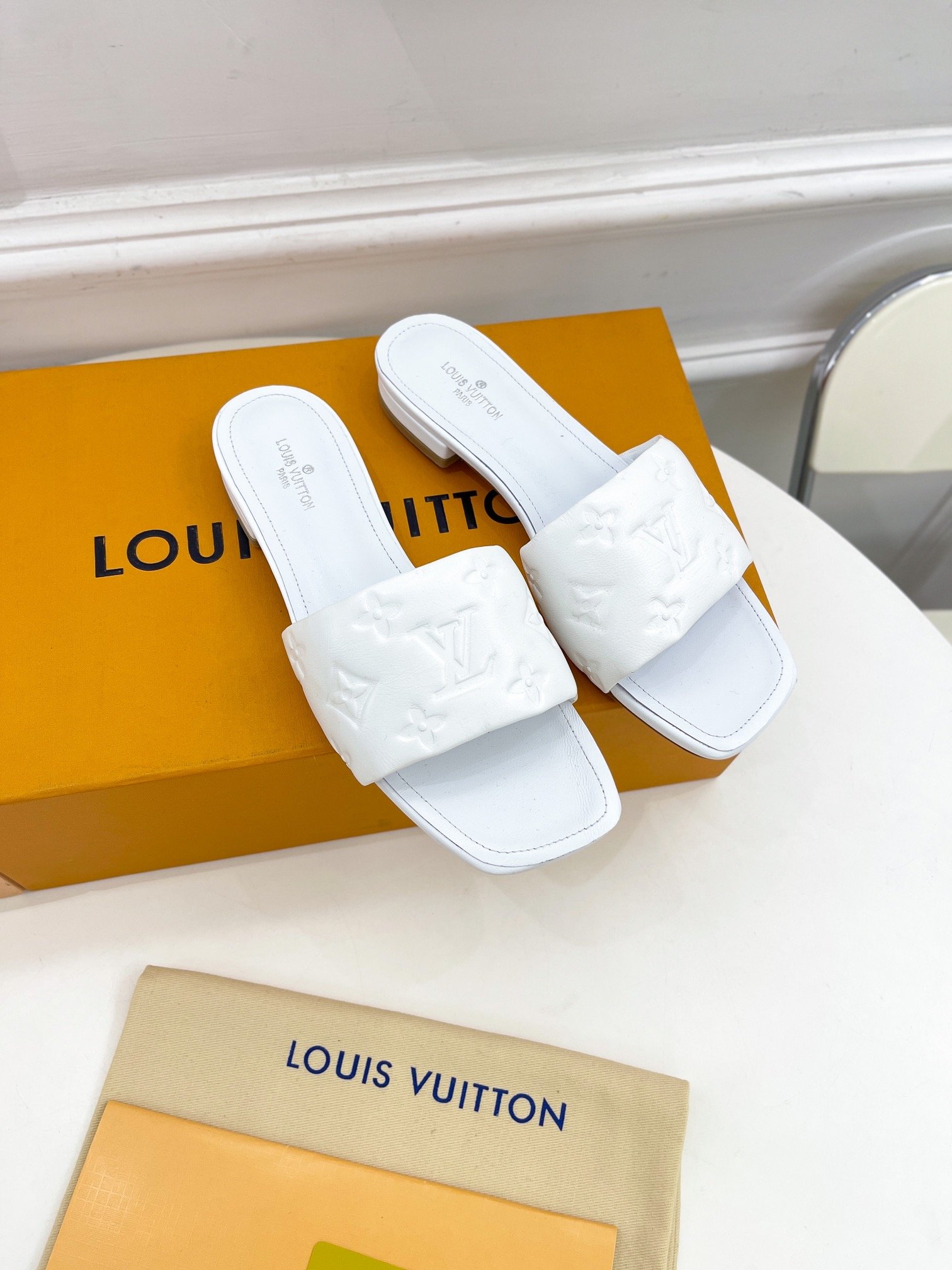 Louis Vuitton Women’s Revival Flat Mule White For Women LV 1A9P4P
