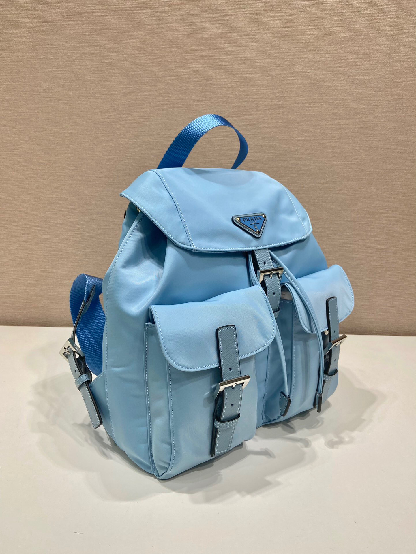 Prada Small Re-Nylon Backpack In Blue For Women 11in/ 28cm 1BZ677_RV44_F0076_V_OOO